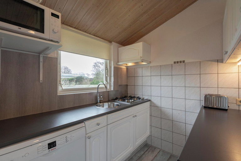 Private kitchen 3, Holiday Home With Playground, Zijpe