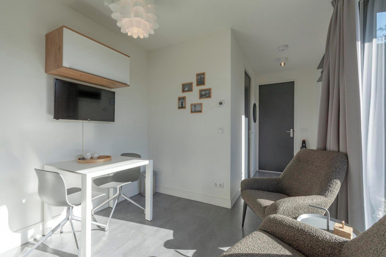 Living room 3, Suite De Uitwaayer for 2-people, Zijpe