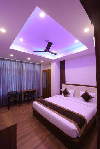 Bedroom 3, Treebo Adithi Comforts Inn and Suites, Mysore