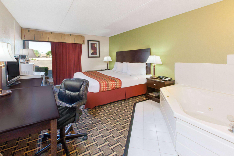Bedroom 3, Days Inn & Suites by Wyndham Madison Heights MI, Oakland