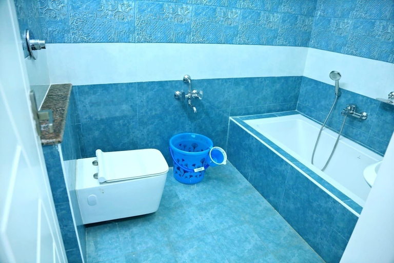 Bathroom 3, Nivaa Stays, Viluppuram