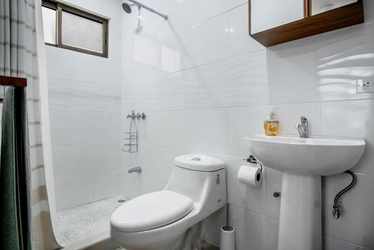 Bathroom, Minimalist Condo with a Beautiful New Design, Enclosed Patio, and Shared Community Pool, Carrillo