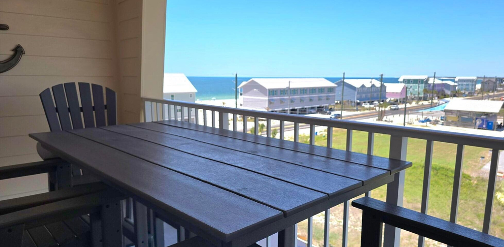 Outdoor dining, Paradise Shores 403 Sunset Paradise, Bay