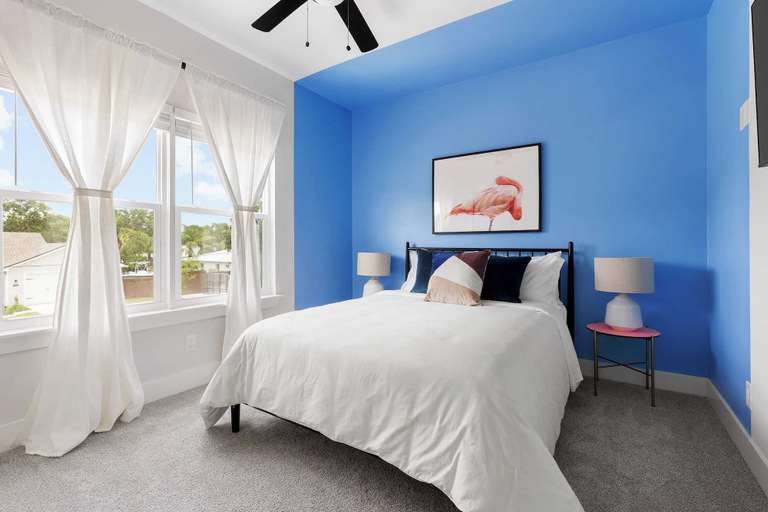 Bedroom 3, Playfully Designed Home + Hot Tub, Fire Pit & Game Room Blue Hour by Avantstay, Saint Johns