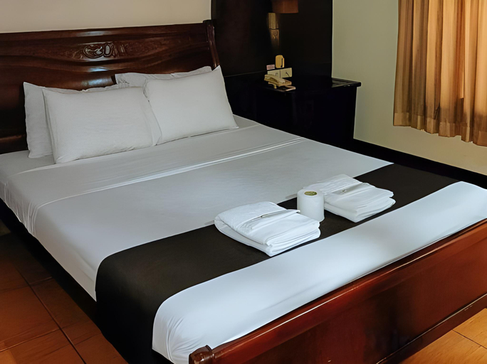Bedroom 3, Check Inn Hotel Dumaguete City by RedDoorz, Dumaguete City