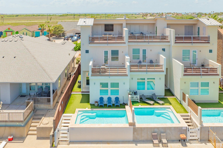 Exterior & Views 2, Waterfront Condo With Rooftop + Pool + Boat Slips, Nueces