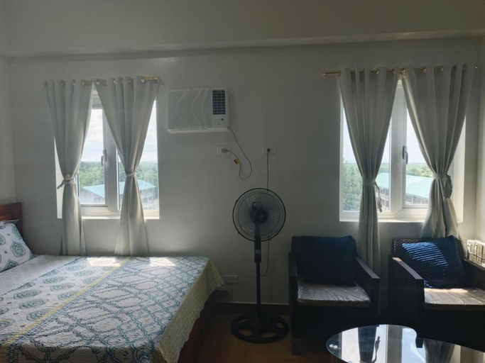 Bedroom 3, Happy Stays A - 300mbps - 65"TV NetFlix, Disney - Washer, Trece Martires City