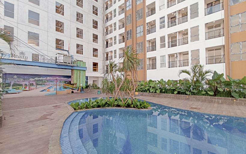 Sport & Beauty 3, Grey Toned 1BR Apartment Tamansari Skylounge Makassar By Travelio, Makassar