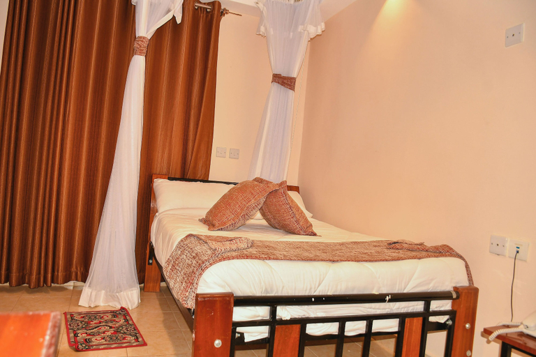 Bedroom 5, Swiss Hibernation Resort, Mwala