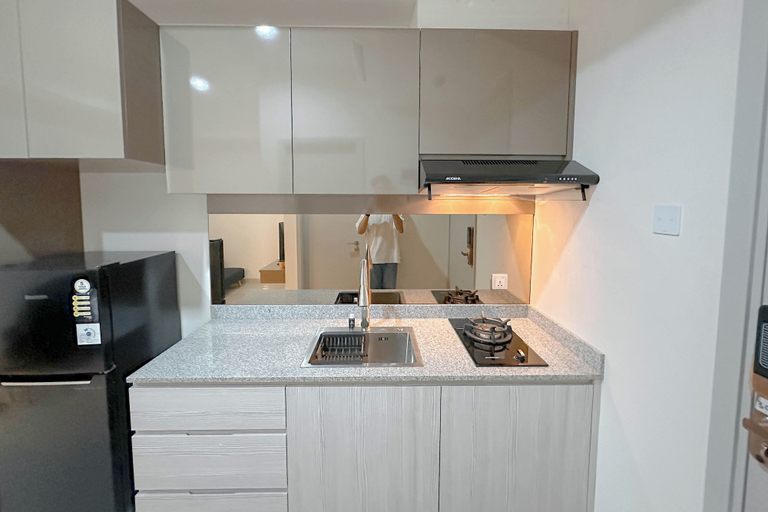 Private kitchen, Modern And Cozy 1Br At Grand Sungkono Lagoon Apartment, Surabaya