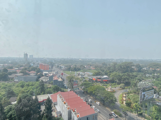 Others 3, Homey And Tranquil 2Br Apartment Transpark Cibubur, Depok