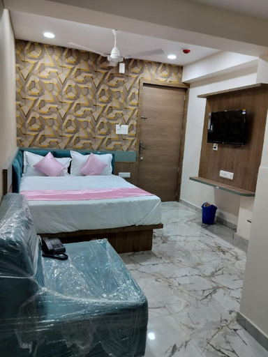 Bedroom 2, Goroomgo NR Nayan Residency Ahmedabad, Ahmadabad