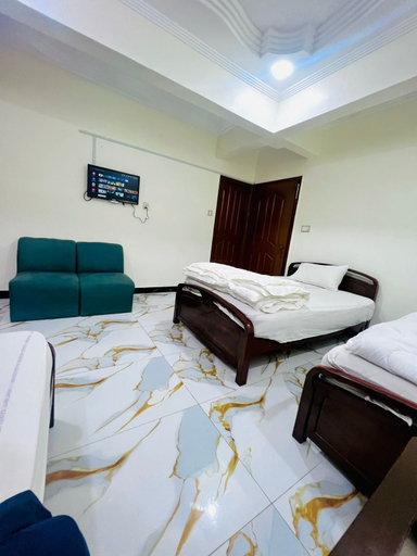 Bedroom 4, Al Amarat Hotel Tariq Road, Karachi