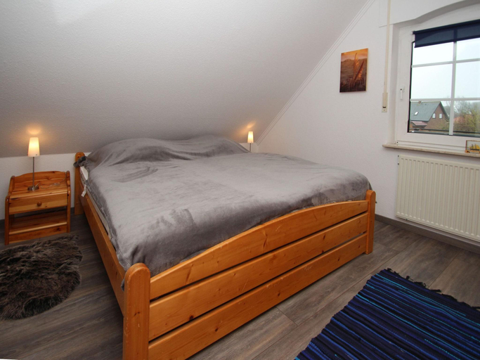 Bedroom 2, Ferienhaus in Dornum mit Garten, Aurich