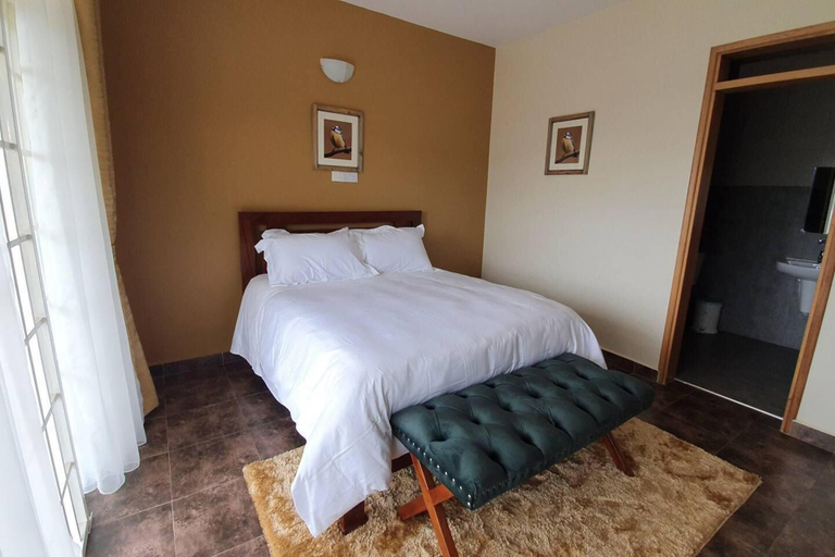 Room 4, Charming 2-bed Apartment in Kigo, Jinja