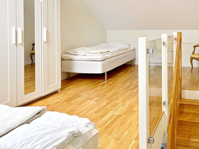 Bedroom 2, person holiday home in MUNSo-By Traum, Ekerö
