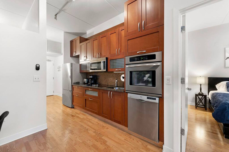 Private kitchen, Sleek 2 Bed 2 Bath Condo in Trendy Fulton Market, Cook