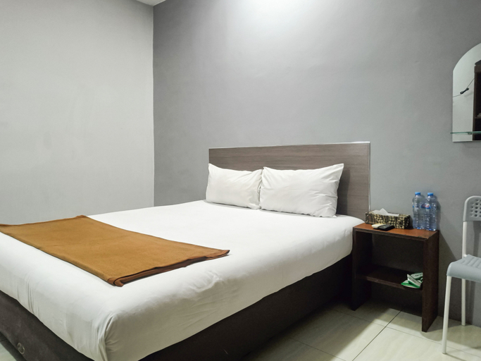 Bedroom 4, Hotel Prisma Mitra RedDoorz, Sidoarjo
