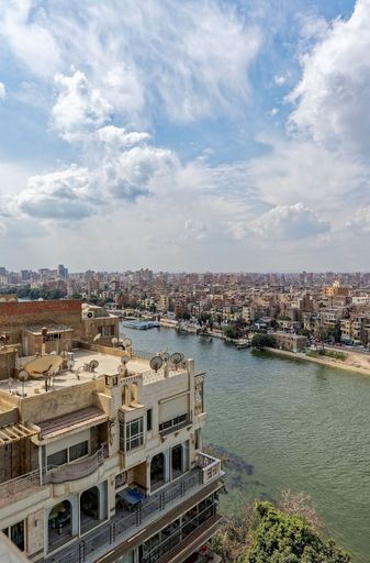 Room 2, Vesta - Panoramic Duplex APT - 3BR - Zamalek, Imbabah