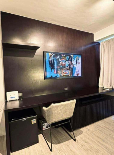 Shared lounge/TV area 3, Modern cozy studio at Amaia Steps North Tower 502, Bacolod City