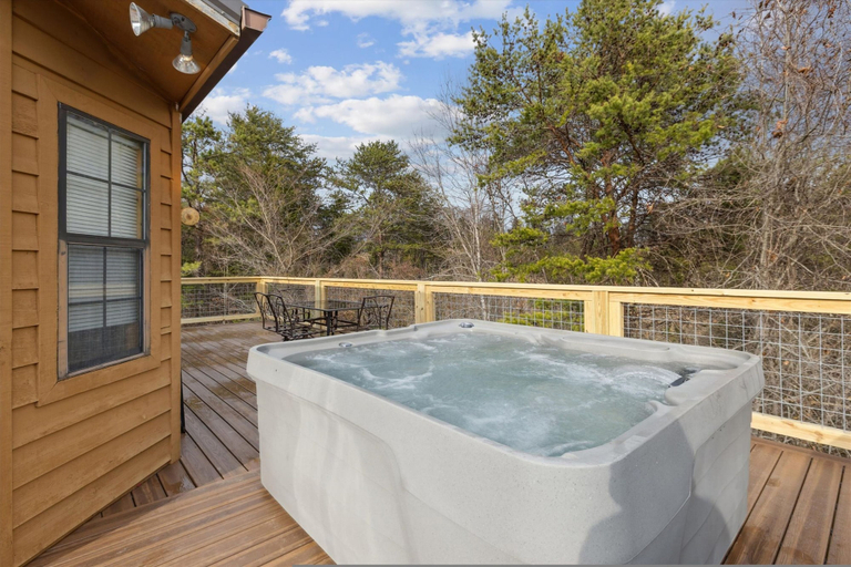 Outdoor spa tub, Perfect Location Ping Pong Foosball Fireplace, Sevier