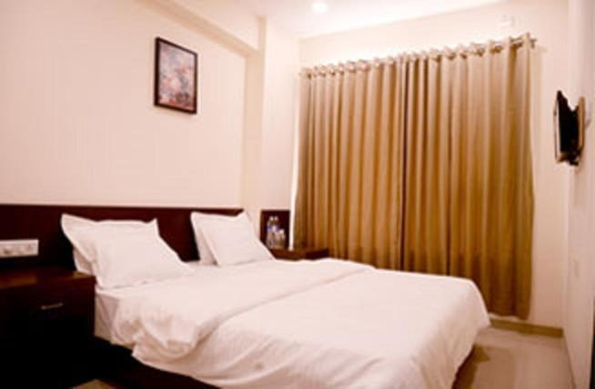 Bedroom, Malhar Grand, Pune