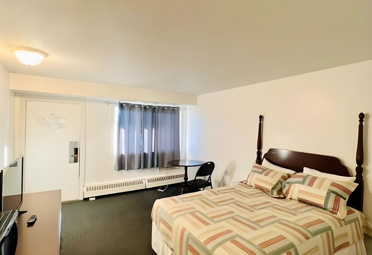Bedroom 3, Midtown Inn, Division No. 11