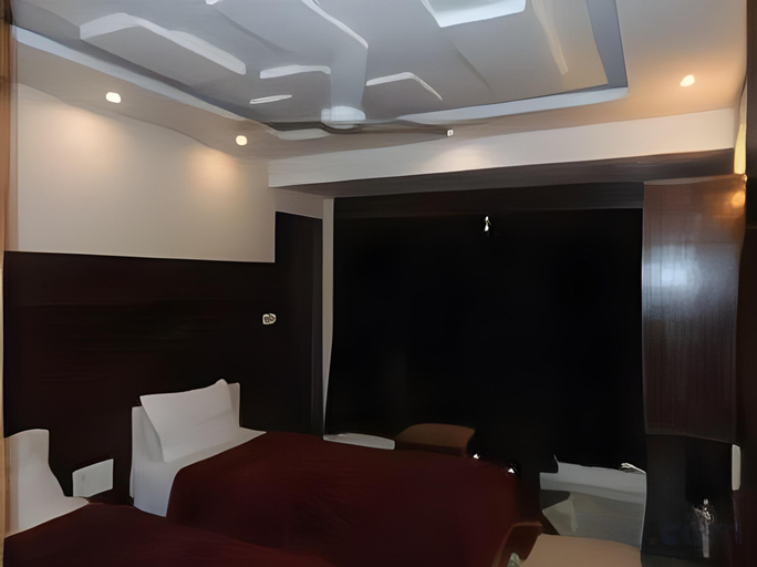 Bedroom 3, HOTEL REST INN, Surat