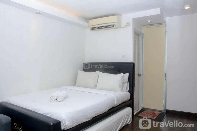Bedroom 5, Cozy Design Studio Bassura City By Travelio, East Jakarta