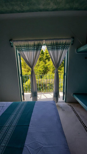 Bedroom, Delphinus Inn, Dist. Pochutla