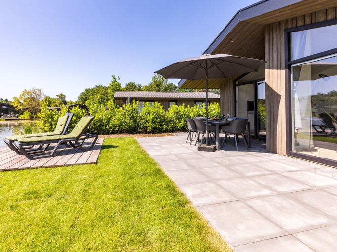 Balcony/terrace 4, Chalet by Pond with Sauna, Eersel