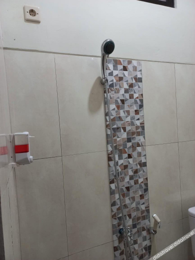 ��他, Omah Paulan Guest House, Solo