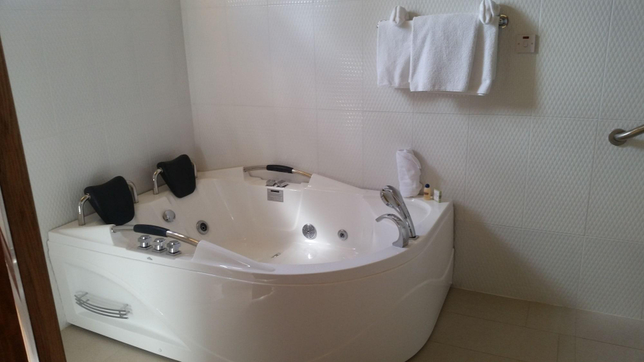 Bathroom 4, Charela Inn