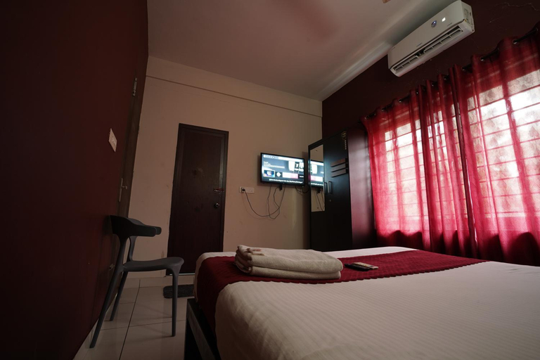 Bedroom 5, Atmos Inn, Kozhikode