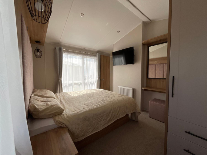 Bedroom 2, 2 bedroom Mini Lodge Caravan at Coopers Beach Holiday Park, Essex