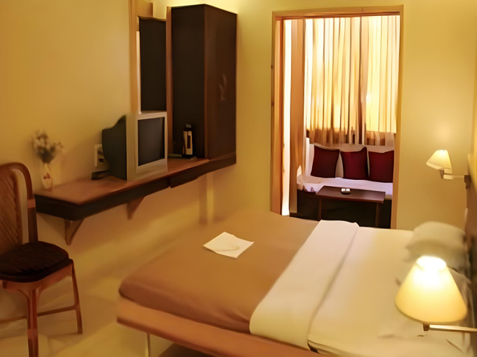 Bedroom 3, Hotel Parichay, Pune