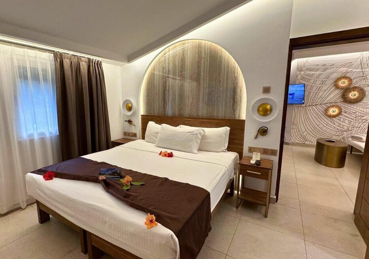 Bedroom 4, Coral Strand Smart Choice Hotel