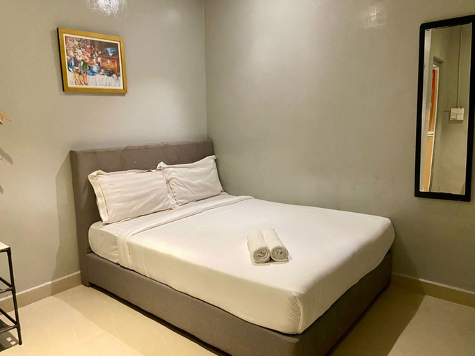 Aman Inn Hotel Room Type - Standard Queen Room Without Window