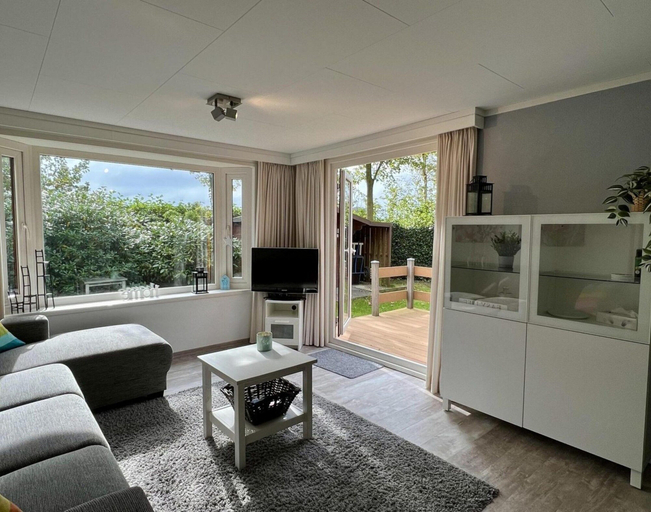 Living area, Modern chalet in Campanula Park with garden, Zijpe