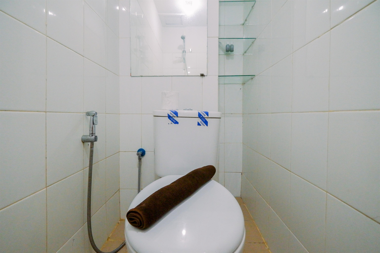 Bathroom 5, Good and Homey Studio at Dramaga Tower Apartment By Travelio, Bogor