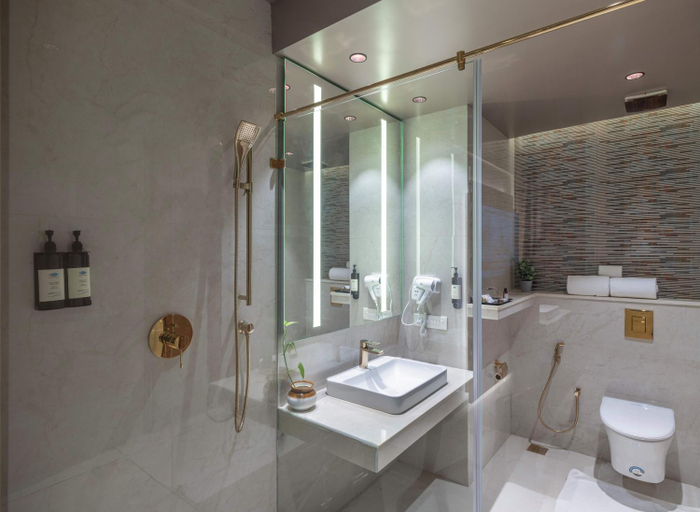 Bathroom 5, Uday Suites - The Garden Hotel, Thiruvananthapuram