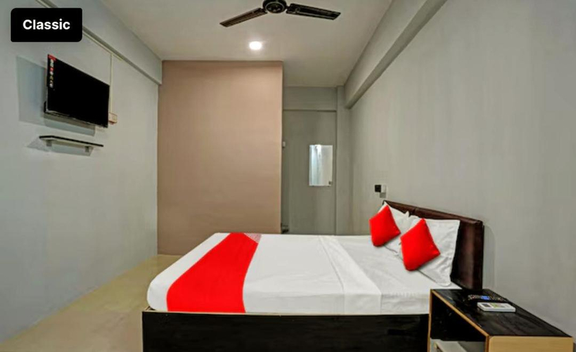 Bedroom 1, Hotel Welcome, Surat