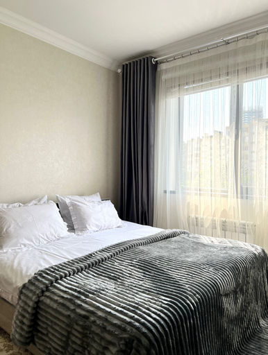 Room 2, Chaqar 121, Tashkent City