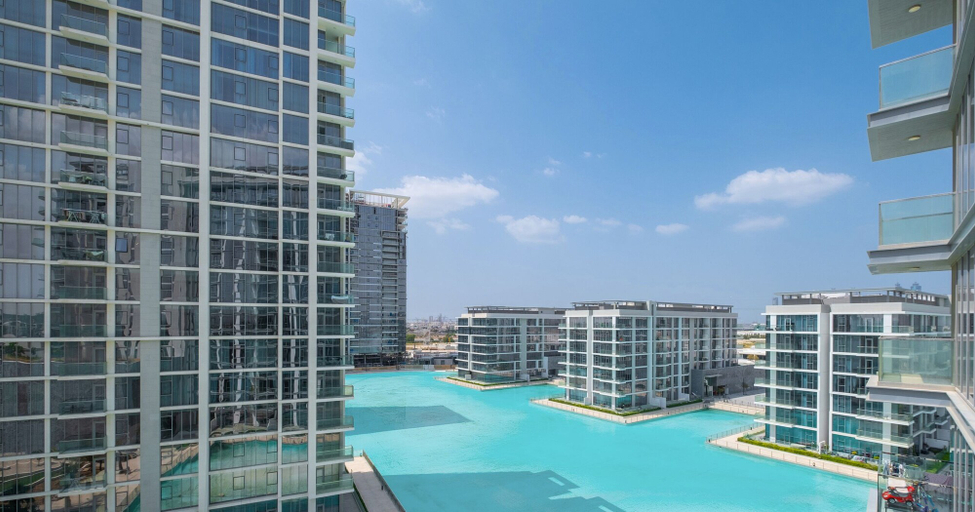 View from room, LUX | 2BR Lagoon View – District One, 10–15 min Burj Khalifa, Dubai