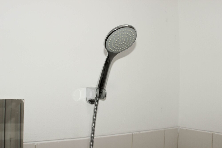 Bathroom 5, Comfy And Tidy Studio At Riverview Jababeka Apartment, Cikarang