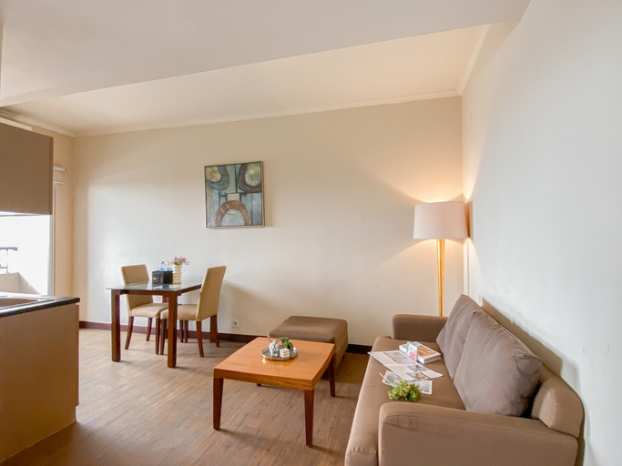 Living Room 5, Spacious 1BR at Marina Ancol Apartment By Travelio, North Jakarta