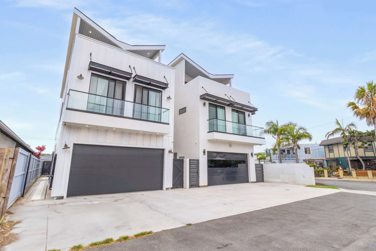 Parking 2, @ Marbella Lane - Luxe 4BR Haven w/ Skyscape Views, Orange