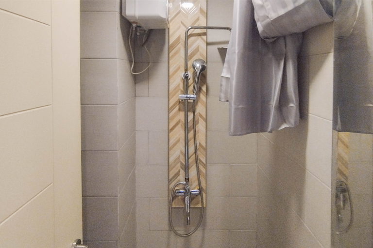 Bathroom 5, Compact Designed Studio at Anderson Supermall Mansion Apartment By Travelio, Surabaya