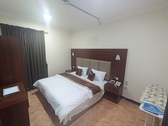 Bedroom 2, Al Eairy Serviced Apartments Company is a one person company 4, Al Ahsa