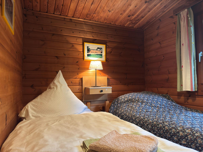 Bedroom 2, Charmantes Ferienhaus mit Terrasse in der Sudheide, Celle
